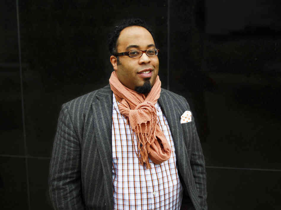 Poet Kevin Young visits NPR headquarters in Washington, D.C., on Friday as a NewsPoet guest.