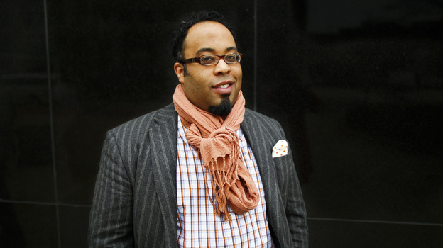 Poet Kevin Young visits NPR headquarters in Washington, D.C., on Friday as a NewsPoet guest. (NPR)