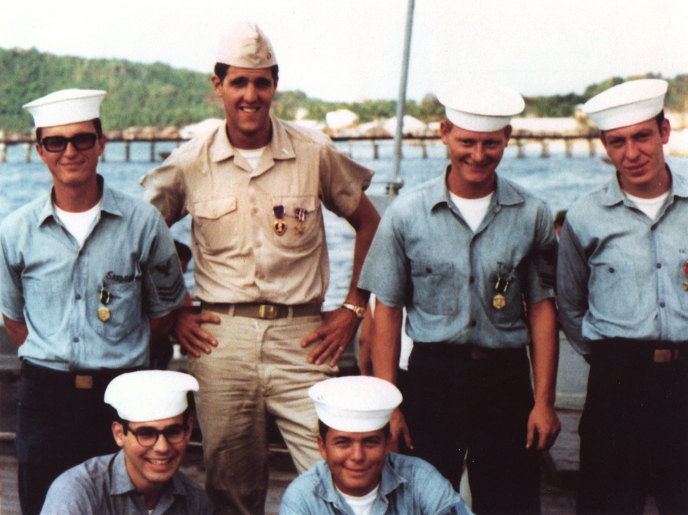 Future U.S. senator and presidential candidate John Kerry poses with crewmates during the Vietnam War in this file photo. An attack on his service by a group calling itself the Swift Boat Veterans for Truth is remembered as a turning point in the 2004 election. But political scientists say negative ads might not be that effective.