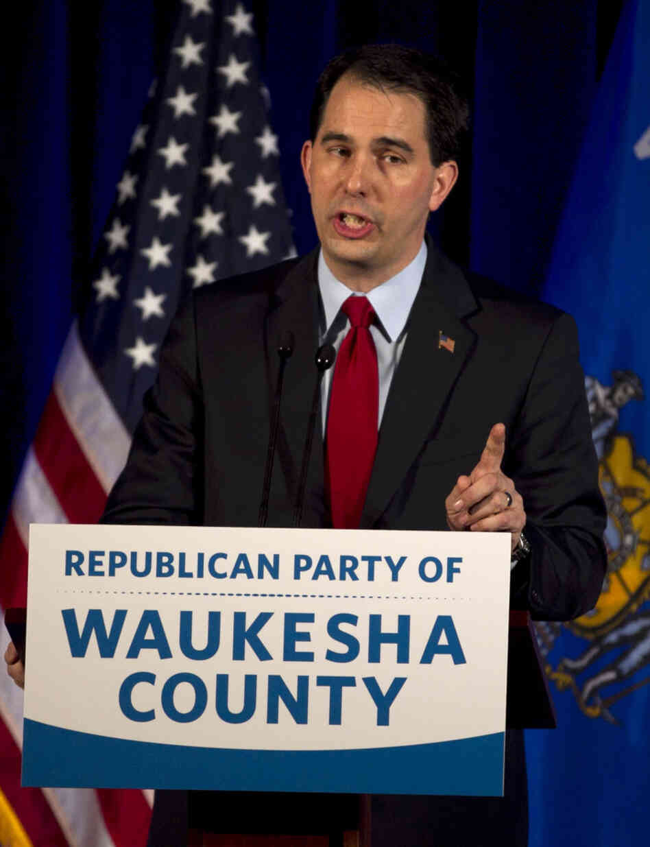Wisconsin Gov. Scott Walker speaks to the Waukesha County Republican dinner in Pewaukee, Wis., on Saturday.