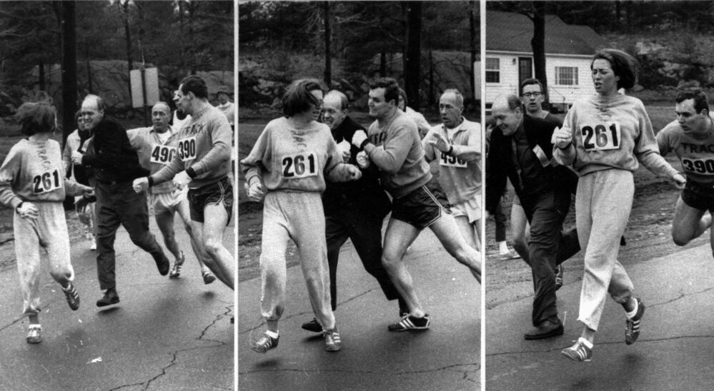 Kathrine Switzer of Syracuse found herself about to be thrown out of the normally all-male Boston Marathon when a husky companion, Thomas Miller of Syracuse, threw a block that tossed a race official out of the running instead.