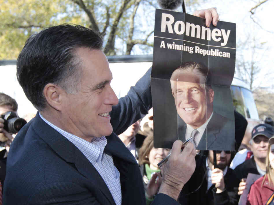 Mitt Romney with campaign poster for his father, George, in Spartanburg, SC, January 2012.  