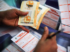 Buying Mega Millions tickets Friday in Covina, Calif. Buying Mega Millions tickets Friday in Covina, Calif.