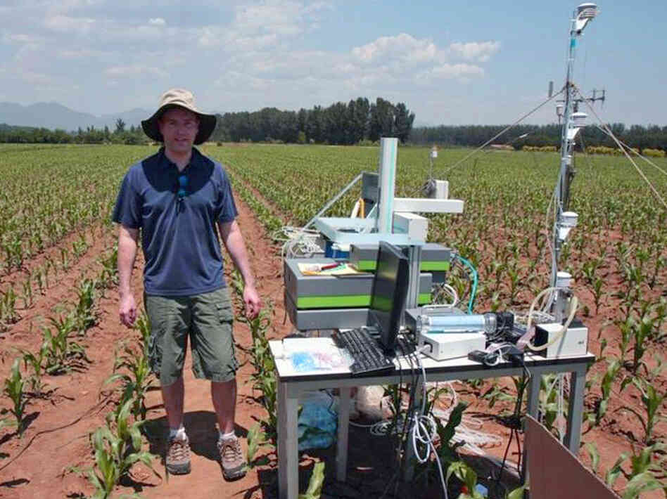 Aaron Van Pelt of Picarro uses one of the company's isotope analyzer in the field in China.