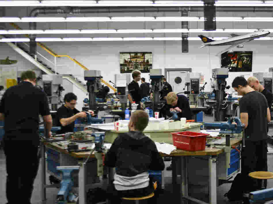 Apprentices are trained at the Lufthansa Technik training center in Hamburg last month. About 60 percent of German high school students opt for vocational training over further academic education.