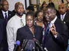 Sybrina Fulton (C) and Tracy Martin (L), parents of Trayvon Martin, listen while their friend and lawyer Benjamin Crump speaks to the press after a forum of Democratic members of the House Judiciary Committee on Capitol Hill March 27, 2012 in Washington, DC. In the second hour, we'll talk about how the news media is covering the Trayvon Martin case.