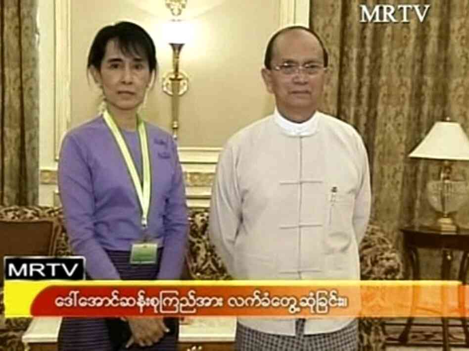 A screen grab from MRTV of Nobel Peace Prize winner Aung San Suu Kyi with Myanmar president Thein Sein during a one hour meeting in August 2011. 