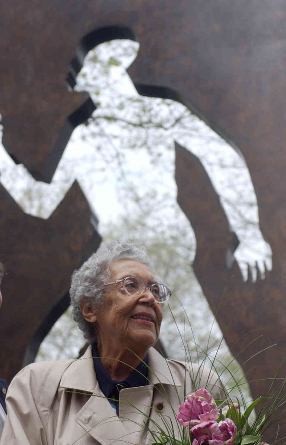 Sculptor Elizabeth Catlett shown in front of her Invisible Man sculpture in New York City in 2003. Sculptor Elizabeth Catlett shown in front of her Invisible Man sculpture in New York City in 2003.