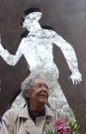 Sculptor Elizabeth Catlett shown in front of her Invisible Man sculpture in New York City in 2003. Sculptor Elizabeth Catlett shown in front of her Invisible Man sculpture in New York City in 2003.