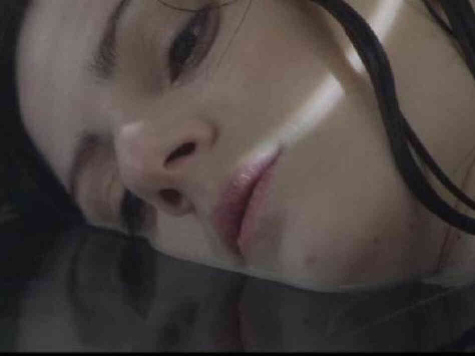 Sinking into something: Aleksa Palladino in a still from the video for Exitmusic's "Passage."