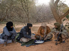 Tuareg rebels eat a meal last month near the Malian city of Timbuktu, which they recently captured. The rebels have taken control of northern Mali, raising concerns about stability in the broader region. Tuareg rebels eat a meal last month near the Malian city of Timbuktu, which they recently captured. The rebels have taken control of northern Mali, raising concerns about stability in the broader region.