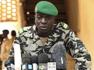 The leader of Mali's military junta, army Capt. Amadou Sanogo, speaks at a news conference outside the capital Bamako on Saturday. He says he wants to hold a consultative conference on Mali's future, but has not offered detailed plans. The leader of Mali's military junta, army Capt. Amadou Sanogo, speaks at a news conference outside the capital Bamako on Saturday. He says he wants to hold a consultative conference on Mali's future, but has not offered detailed plans.
