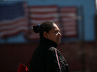 A Hispanic woman walks down a street in Union City, N.J. In a new study, the Pew Hispanic Center asked Hispanic-Americans how they identify themselves. A Hispanic woman walks down a street in Union City, N.J. In a new study, the Pew Hispanic Center asked Hispanic-Americans how they identify themselves.