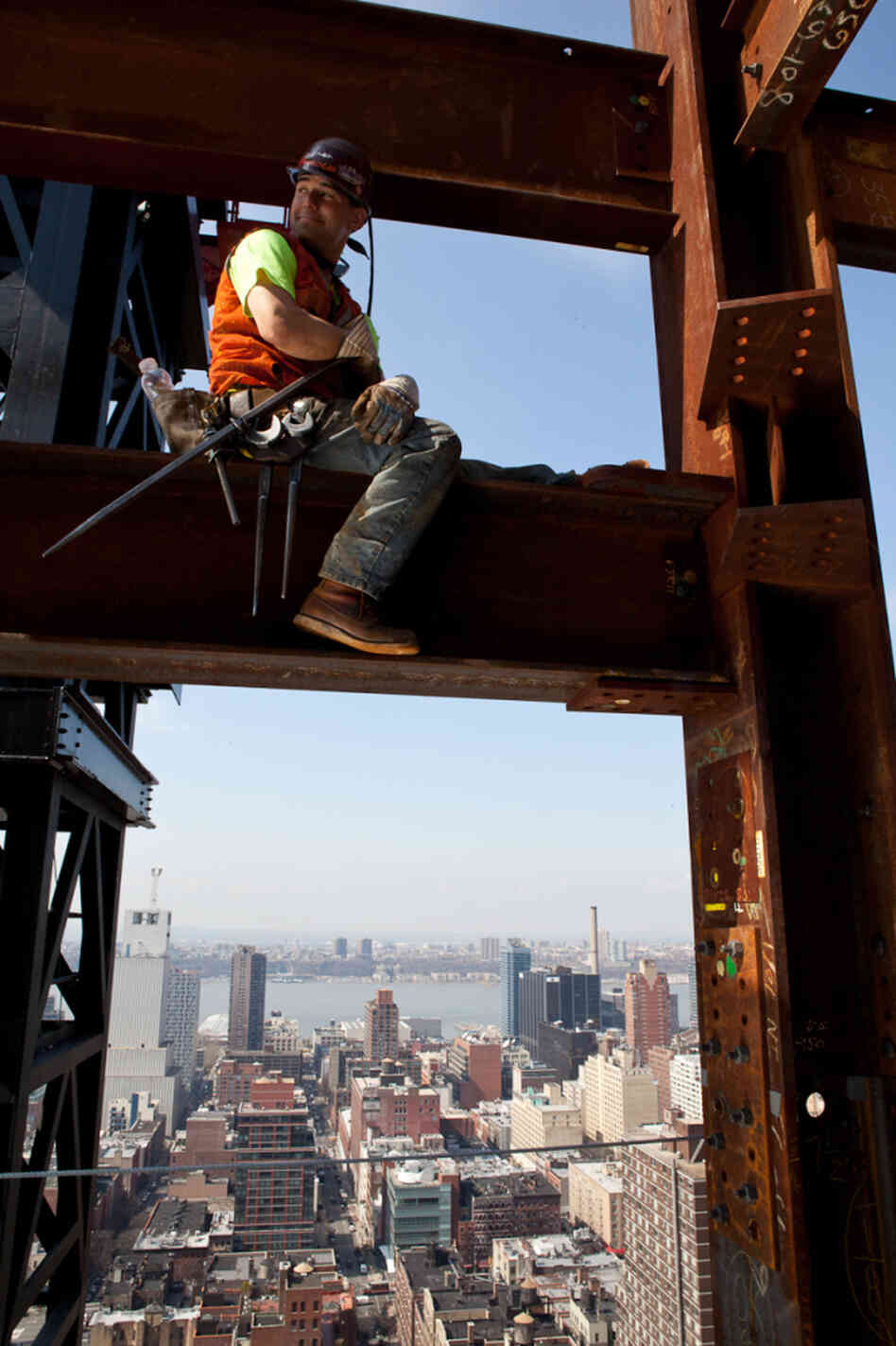 Kaniehtakeron Martin takes a break from working on what will be the 27th floor of an office building in New York City. Kaniehtakeron Martin takes a break from working on what will be the 27th floor of an office building in New York City.