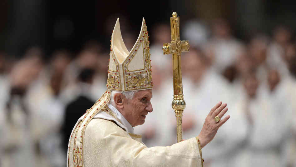 Pope Benedict XVI waves as he leaves at the end of the Chrismal mass in the morning of Holy Thursday on Thursday.