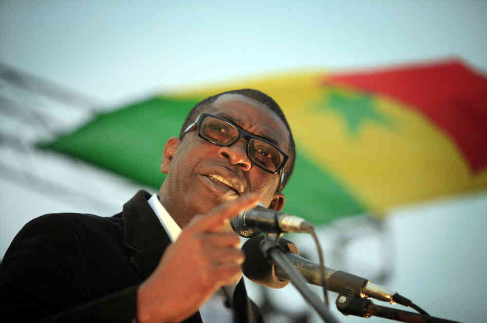 Youssou N'dour speaks during a united opposition rally in February.