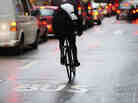 In our second hour, guests talk about how the bad behavior of some bicyclists could present a road block on how cities adapt to them.