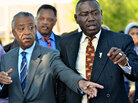 Benjamin Crump (right), the attorney for Trayvon Martin's family, is joined by the Revs. Al Sharpton and Jessie Jackson at a protest in Sanford, Fla., last week. Crump has enlisted the help of prominent civil rights activists to draw attention to the case. Benjamin Crump (right), the attorney for Trayvon Martin's family, is joined by the Revs. Al Sharpton and Jessie Jackson at a protest in Sanford, Fla., last week. Crump has enlisted the help of prominent civil rights activists to draw attention to the case.