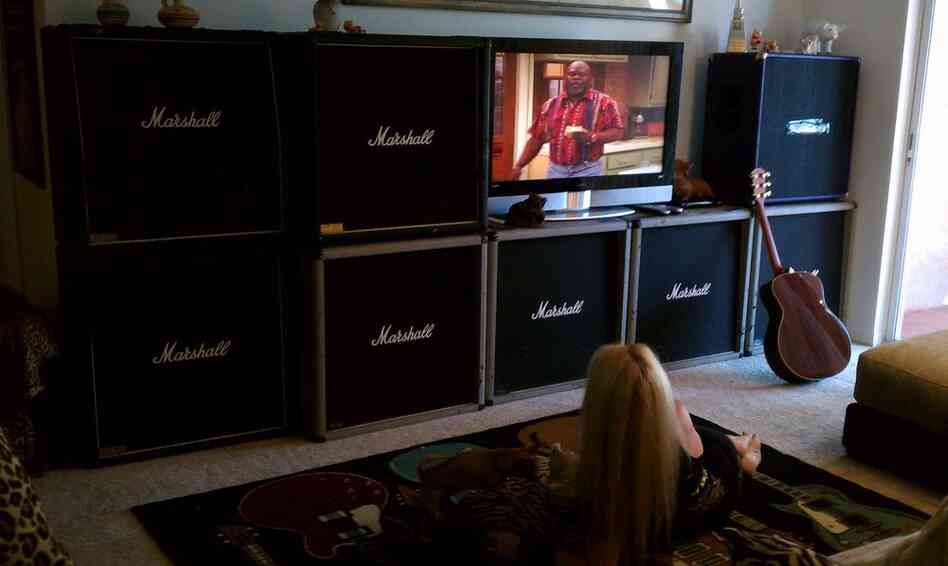 Former Runaways guitarist and hard rock goddess Lita Ford sent us this picture with her Marshall-stacked home entertainment center. She writes via email: "[Jim Marshall] can rest easy and go to his grave knowing the profound effect he's had on the face of the WORLD of music that will remain with us forever!!!!! His tombstone should be a Marshall stack. His voice will live on through those speak...