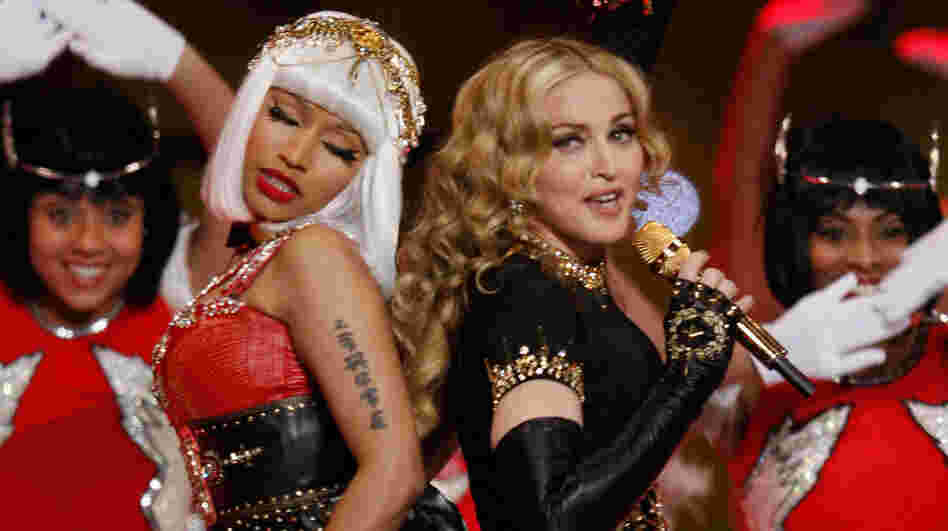 Nicki Minaj (left) and Madonna perform during the halftime show at the Super Bowl in February. In a song from Madonna's new album, MDNA, the two singers each play with traditionally feminine and masculine gender roles.