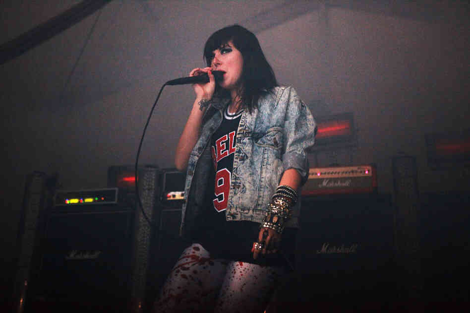 Sleigh Bells vocalist Alexis Krauss purrs in front of amp stacks for in-the-red electro-pop songs at the 2011 Sasquatch Music Festival. The band's Marshall worship comes from guitarist Derek Miller's past in Florida metal band Poison the Well. 