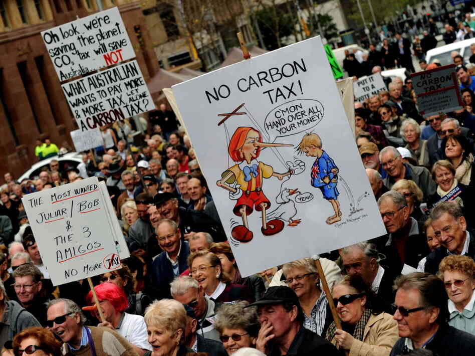 Protesters rally in Sydney last July against Australian Prime Minister Julia Gillard's planned carbon tax.