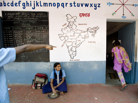 On days she comes to school hungry, K. Suchitra (center) knows she can eat at school.