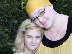 Jane Bingham with her daughter, Belleliana. She started a "Beautiful and Bald Barbie" campaign on Facebook after her battle with non-Hodgkin's lymphoma.