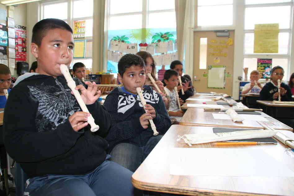 Students play the recorder in Academic Music class at Allen Elementary School in San Bruno, Calif. Teachers are using music notes to teach fractions. Students play the recorder in Academic Music class at Allen Elementary School in San Bruno, Calif. Teachers are using music notes to teach fractions.