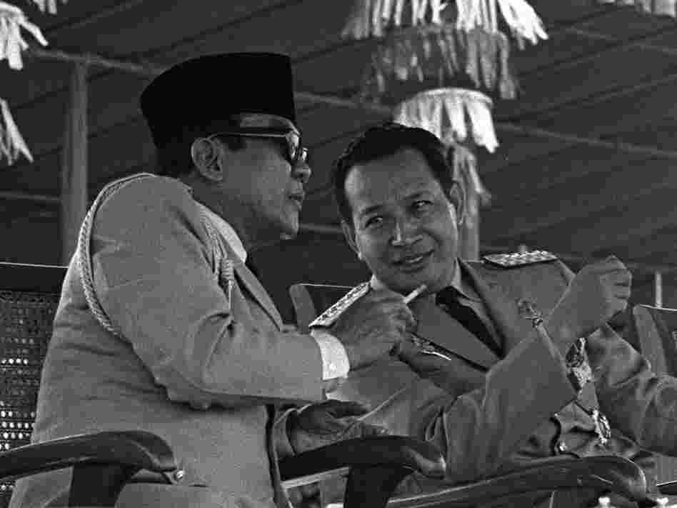 Indonesian President Sukarno (left) surrenders his executive powers to Gen. Suharto, Feb. 22, 1967, in Jakarta. Suharto led the anti-communist purge and ruled the country until 1998.