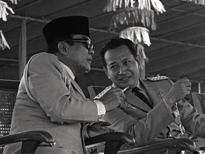 Indonesian President Sukarno (left) surrenders his executive powers to Gen. Suharto, Feb. 22, 1967, in Jakarta. Suharto led the anti-communist purge and ruled the country until 1998. Indonesian President Sukarno (left) surrenders his executive powers to Gen. Suharto, Feb. 22, 1967, in Jakarta. Suharto led the anti-communist purge and ruled the country until 1998.
