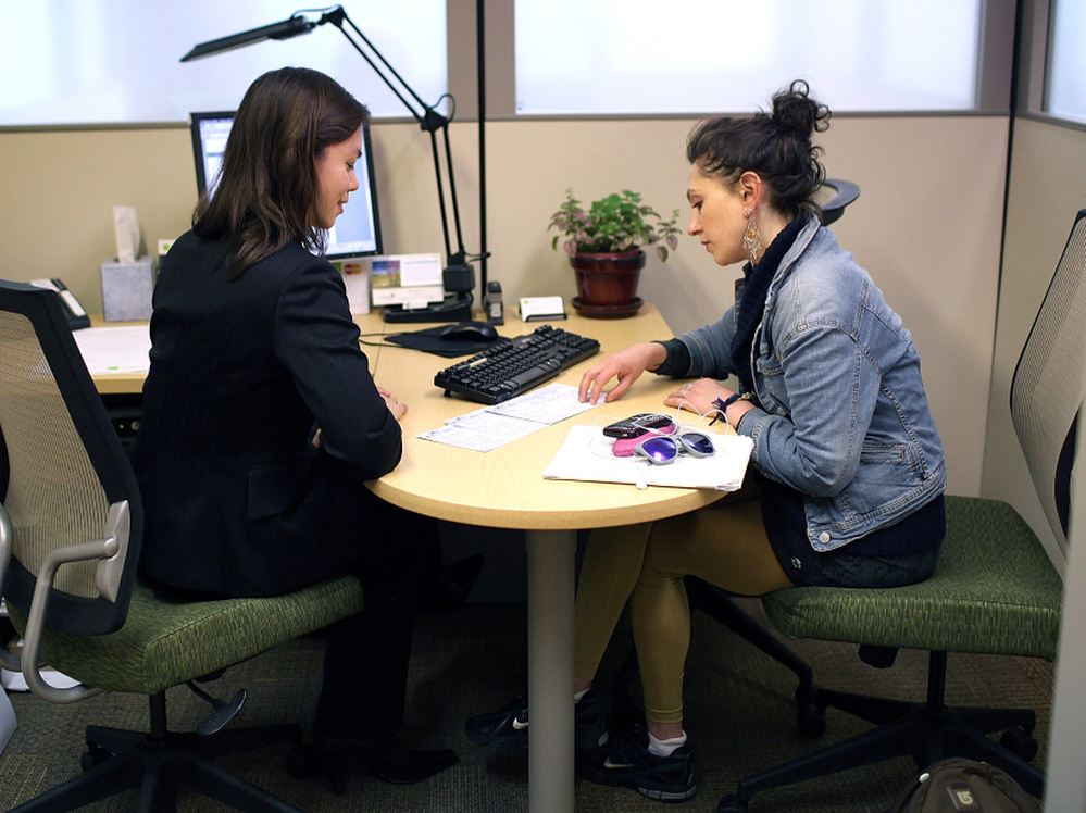 Which tax preparation service is best? That's what writer Joel Stein hoped to find out when he took his 2011 income data to different firms — including an H&R Block office, seen here in a file photo from last year's tax season. 