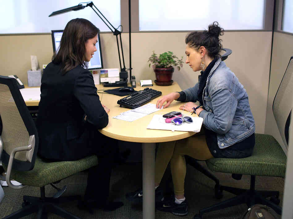Which tax preparation service is best? That's what writer Joel Stein hoped to find out when he took his 2011 income data to different firms — including an H&R Block office, seen here in a file photo from last year's tax season. 