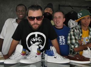 Gideon Shoes co-founder Matt Noffs with youth from The Street University, the nonprofit youth center that launched the fair trade company. Gideon Shoes co-founder Matt Noffs with youth from The Street University, the nonprofit youth center that launched the fair trade company.