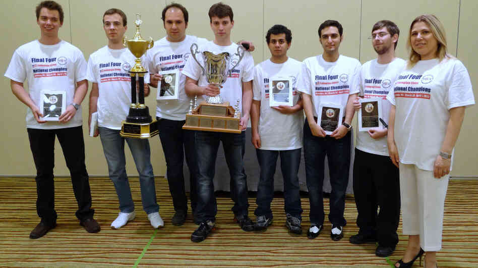Texas Tech University coach Susan Polgar, right, and her championship team. The coach and her top players are transferring to Webster University. 