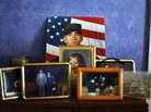 A portrait of Spc. Jonathan Nestico, 27, is displayed in his family's home in Woburn, Mass. A portrait of Spc. Jonathan Nestico, 27, is displayed in his family's home in Woburn, Mass.