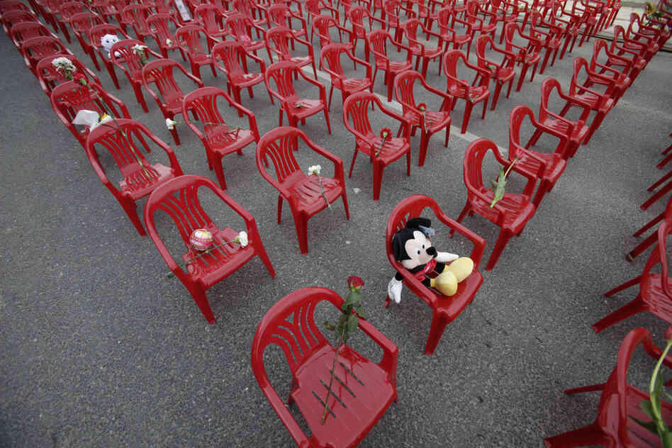 Sarajevans placed toys and flowers on the chairs, which remained empty through memorial ceremonies. 