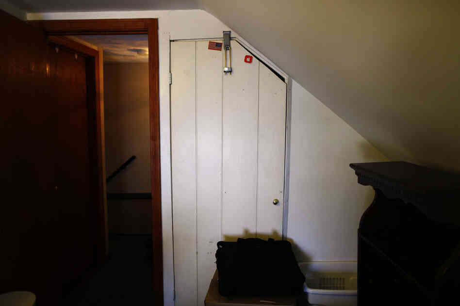 John's bare room in the house he shares with his parents and older brother Frank III in Woburn, Mass. John leaves all his belongings locked in the closet while he is away.