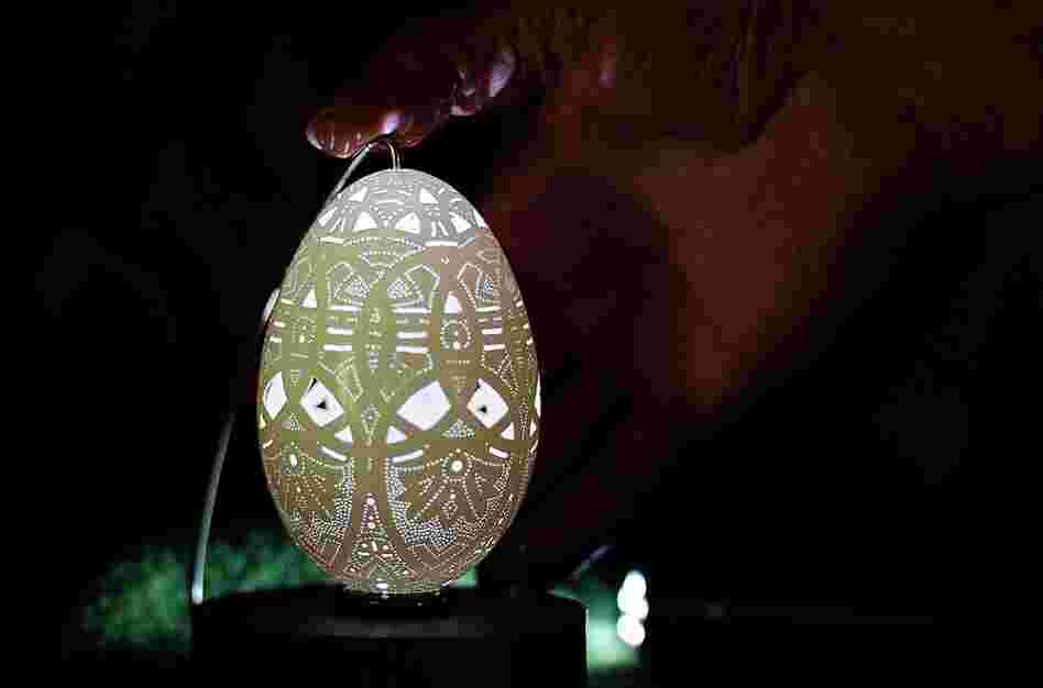 Slovenian artist Franc Grom drilled 20,000 minute holes to craft this luminous Easter egg. 