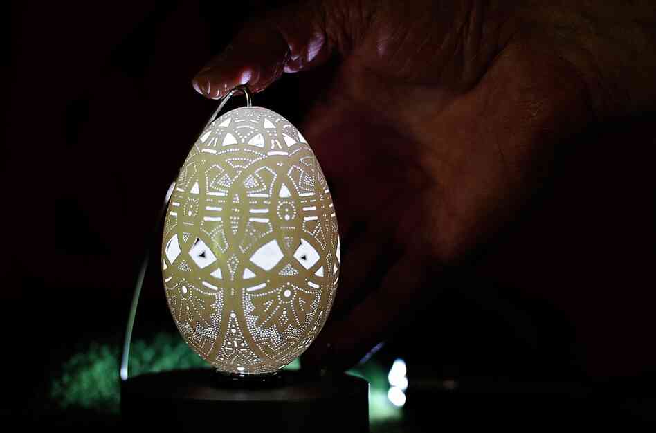 Slovenian artist Franc Grom drilled 20,000 minute holes to craft this luminous Easter egg. 