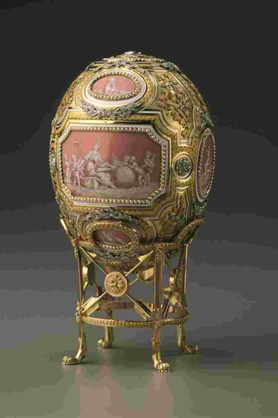 The Catherine the Great Easter egg was commissioned by Czar Nicholas II for his mother. The Faberge workshop crafted it out of diamonds, pearls, silver, gold, platinum, and a shimmering opalescent enamel. It originally held a tiny statue of Catherine the Great. 