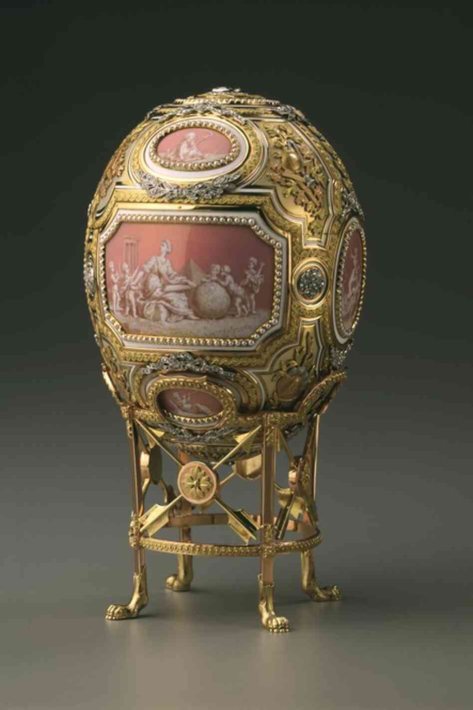 The Catherine the Great Easter egg was commissioned by Czar Nicholas II for his mother. The Faberge workshop crafted it out of diamonds, pearls, silver, gold, platinum, and a shimmering opalescent enamel. It originally held a tiny statue of Catherine the Great. 