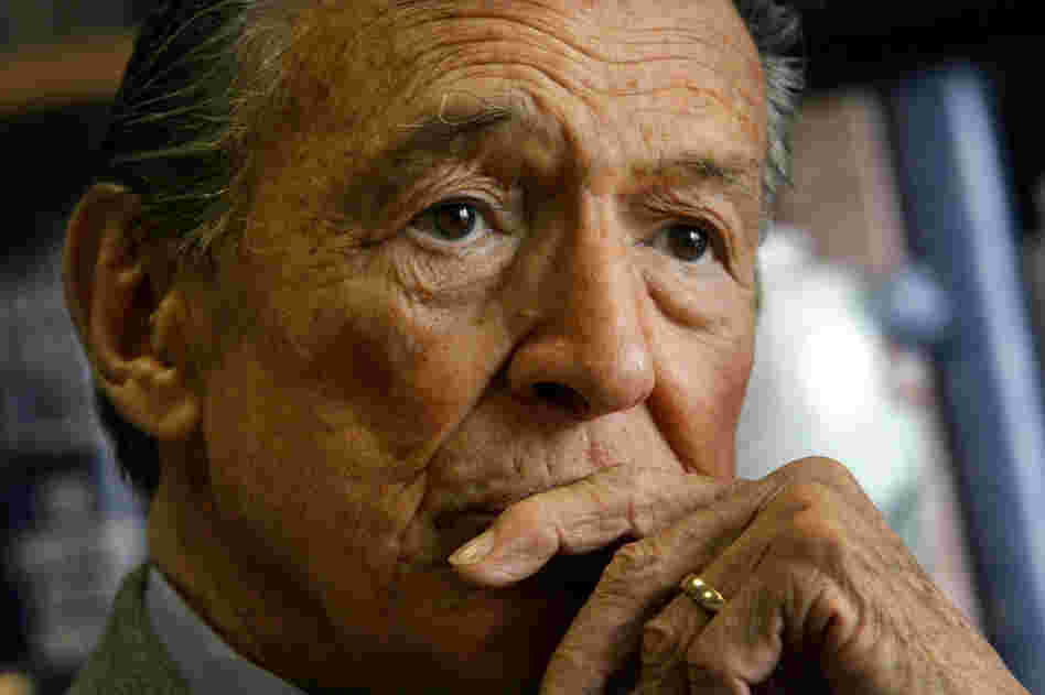 Mike Wallace, whose pitiless, prosecutorial style transformed television journalism and made "60 Minutes" compulsively watchable, died Saturday. He was 93.  