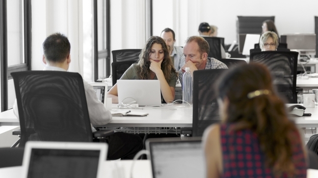 Workers share office space at Grind, a co-working company in New York City. Those who want to use Grind's facilities are vetted through a competitive application process.