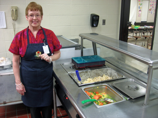 Kathleen Fiengo has worked in school cafeterias for 25 years, but only in the past year did she start cooking supper for kids at Nathan Hale Elementary in Manchester, Conn.