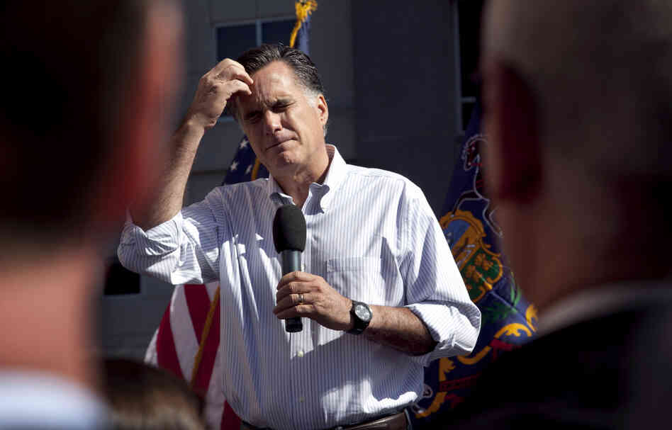 Republican presidential candidate Mitt Romney pauses while speaking at a campaign stop in Harrisburg, Pa., on Thursday. 