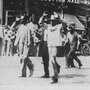 Black detainees are led to the Convention Hall following a race riot in Tulsa, Okla, June 1, 1921. The National Guard rounded up blacks by the thousands and took them to the fairgrounds, the Convention Hall and a baseball stadium where they were given food and water. By day's end, many thriving black businesses in a 35-block area had been torched.