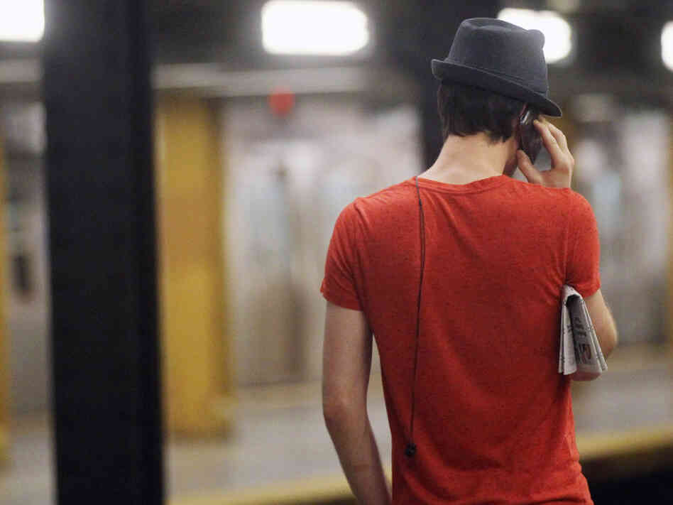 On the phone in Manhattan.