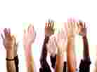 Raised hands variety of races.