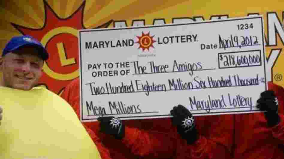 The three anonymous Mega Millions winners celebrate their $218.6 jackpot with a lotto friend. 